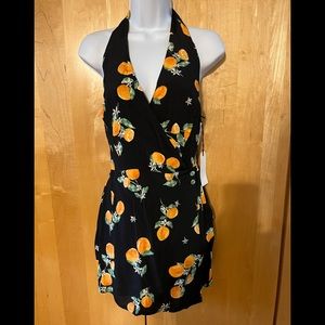Brand New w Tags. Leith Romper.  Woman’s size sm. Black with cute peach print